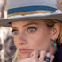 same earwire + similar hang height to our 18K huggie hoop sparkle earrings,<br>here, in turquoise and black gold<br>shop the look > escape <span class='visuallyhidden'>Call, text 323-404-2959 for shopping assistance.</span>